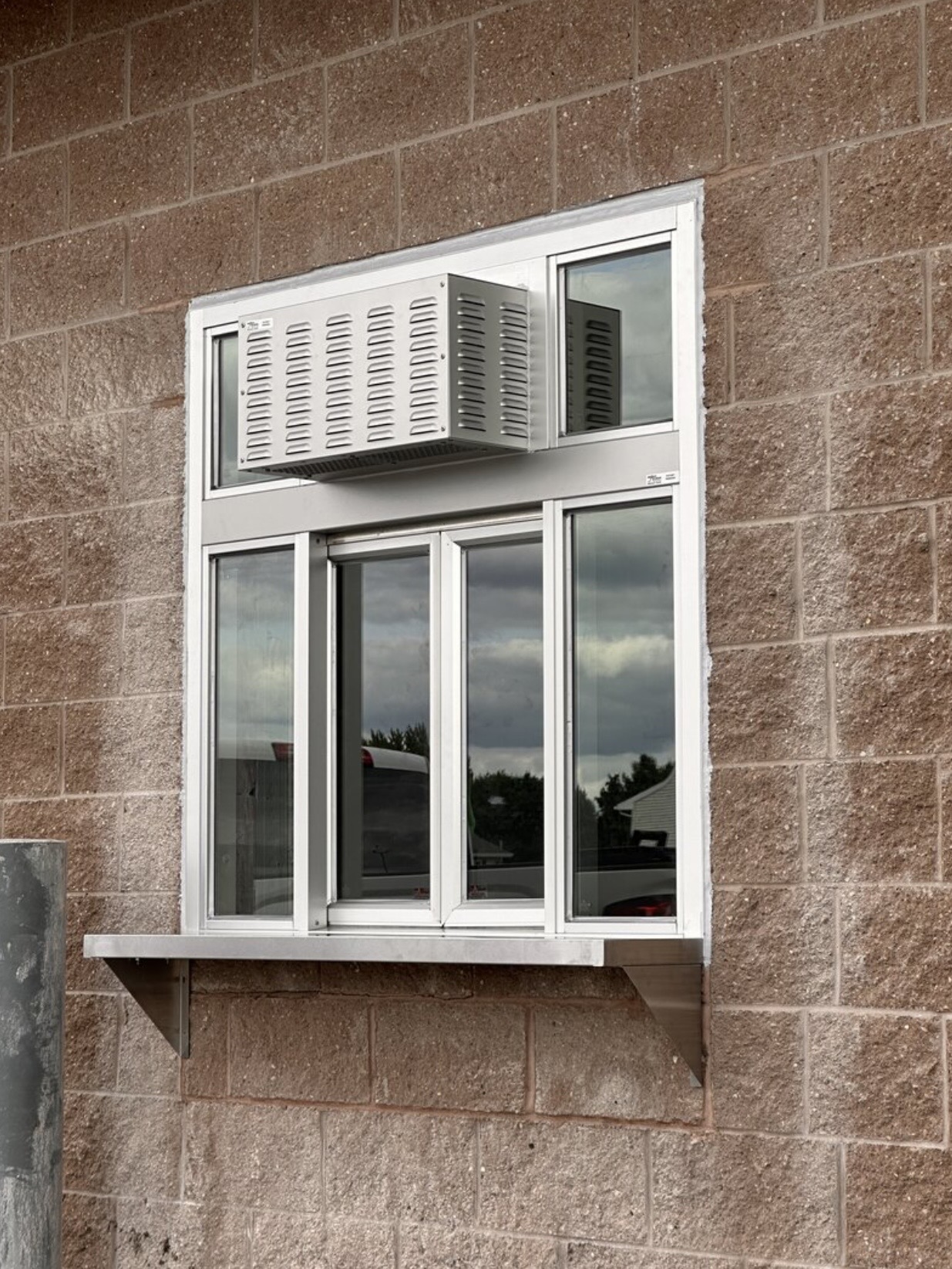 Custom Display Cases, Drive-Through Windows, and Reception Sliding Windows — Reed City Glass West Michigan