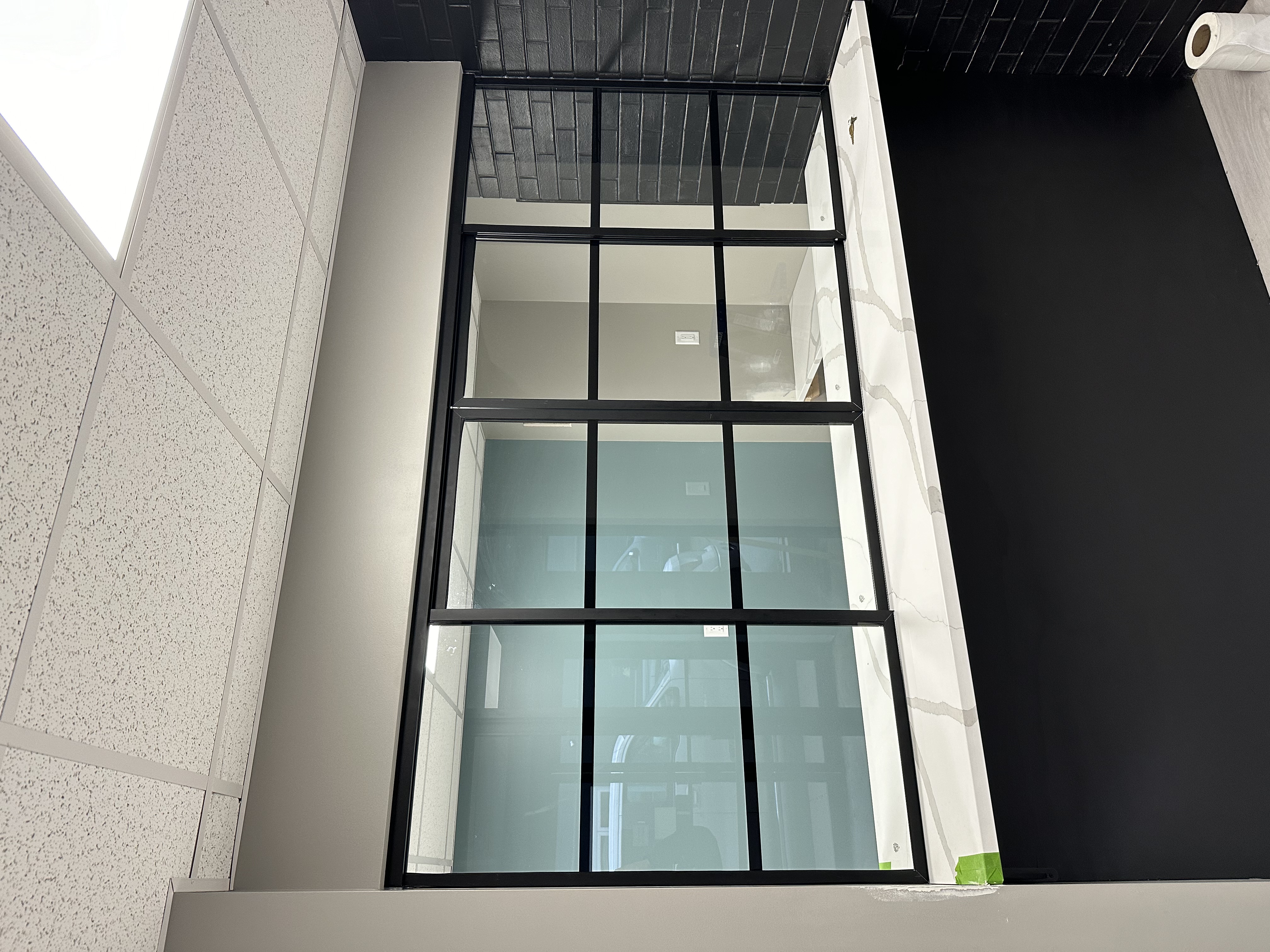 Custom glass partition installation West Michigan