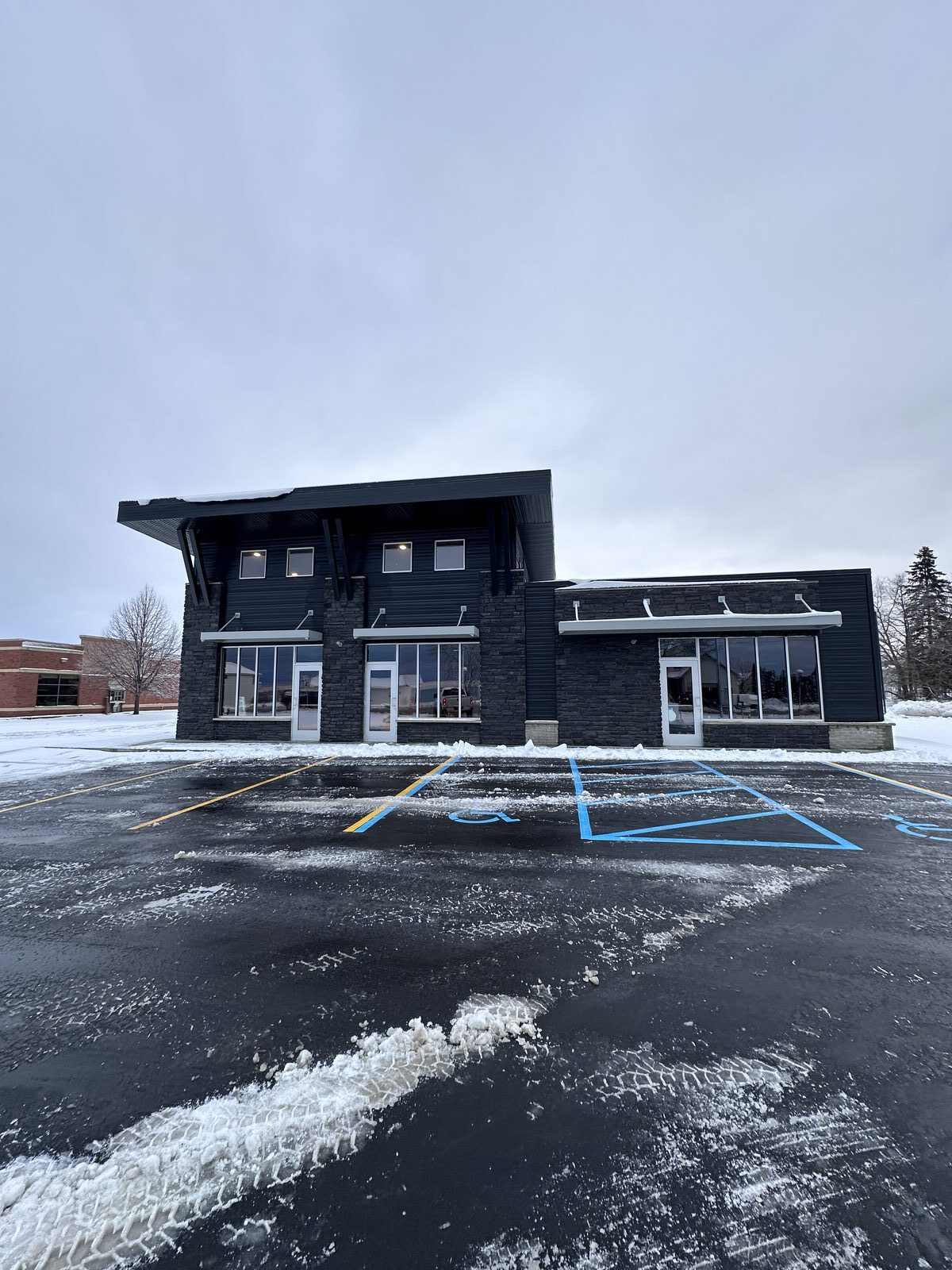 Completed commercial storefront glass installation West Michigan